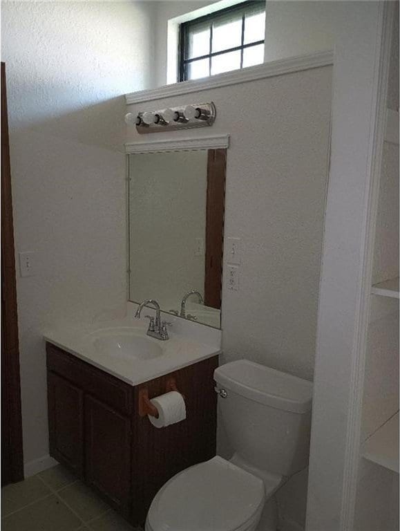 1712 S Hands St, Independence, MO 64055 - bathroom featuring vanity and toilet