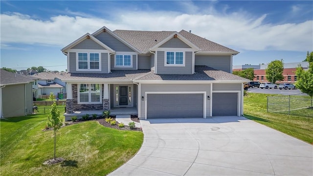 6108 Lewis Dr, Shawnee, KS 66226 - craftsman inspired home with a porch, driveway, roof with shingles, and an attached garage