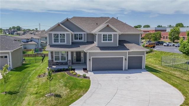 6108 Lewis Dr, Shawnee, KS 66226 - craftsman inspired home with driveway, a shingled roof, covered porch, and a garage