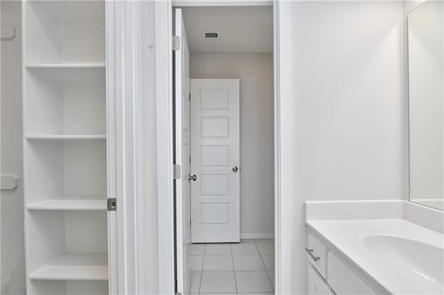 6108 Lewis Dr, Shawnee, KS 66226 - bathroom featuring tile patterned flooring and vanity