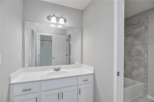 6118 Lewis Dr, Shawnee, KS 66226 - bathroom featuring vanity and washtub / shower combination