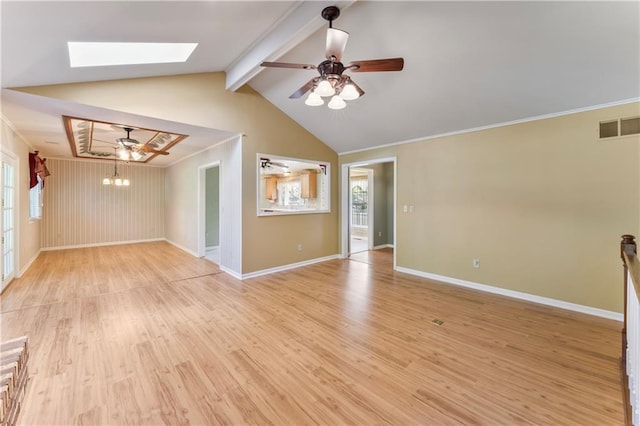 32204 Apple Hill Dr, Paola, KS 66071 - spare room with a ceiling fan, a skylight, light wood finished floors, and ornamental molding