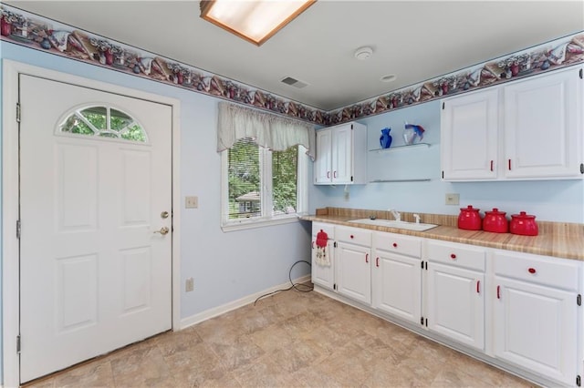 32204 Apple Hill Dr, Paola, KS 66071 - kitchen with light countertops and white cabinets