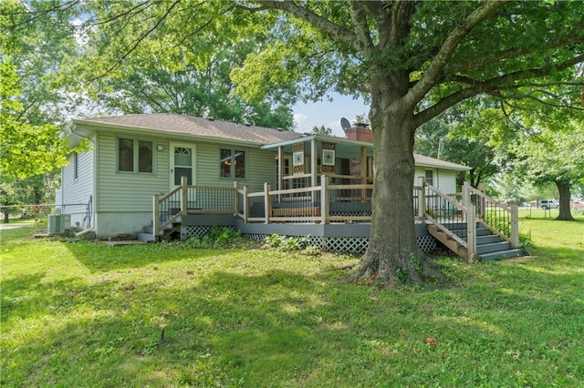 32204 Apple Hill Dr, Paola, KS 66071 - back of house with a lawn, a deck, and stairs