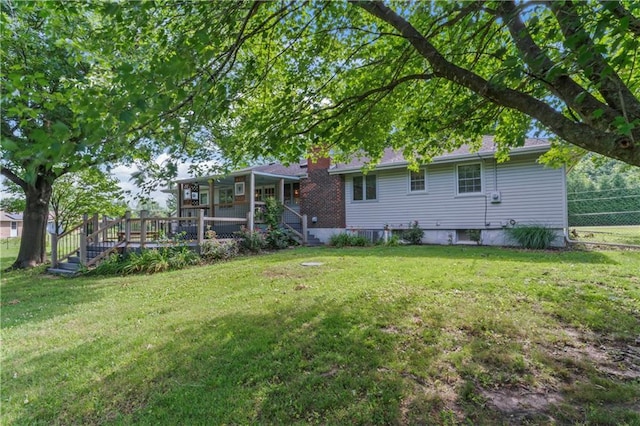 32204 Apple Hill Dr, Paola, KS 66071 - back of house featuring a wooden deck and stairway