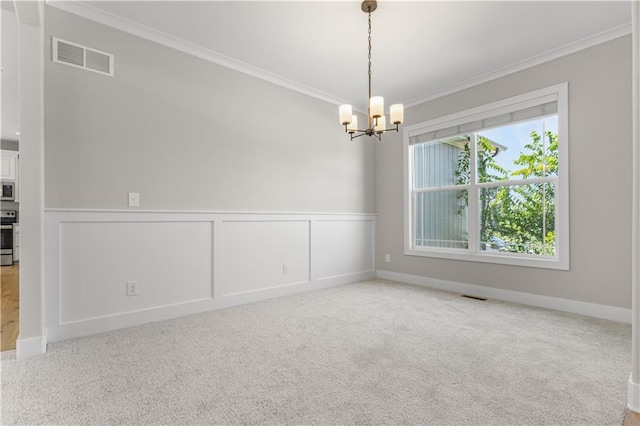 16779 S Durango St, Olathe, KS 66062 - carpeted empty room featuring a chandelier, crown molding, and a wainscoted wall