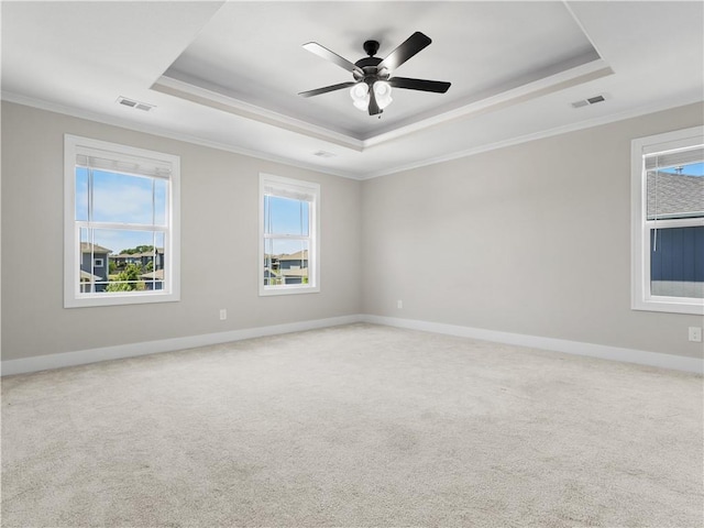 16779 S Durango St, Olathe, KS 66062 - empty room with a raised ceiling, crown molding, carpet, and a ceiling fan