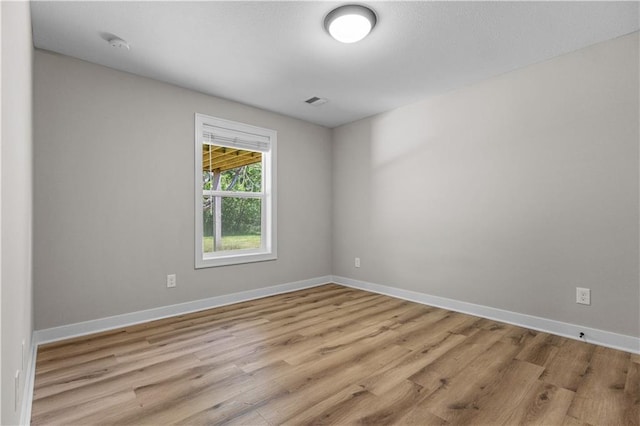 16779 S Durango St, Olathe, KS 66062 - empty room featuring wood finished floors and baseboards