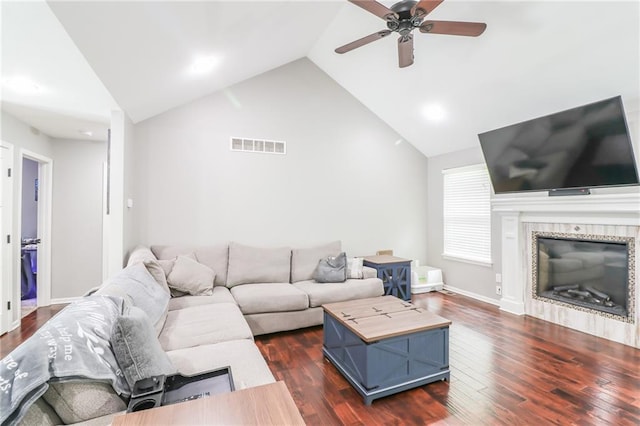 968 E Market St, Warrensburg, MO 64903 - living area featuring a ceiling fan, dark wood-style floors, a glass covered fireplace, high vaulted ceiling, and recessed lighting