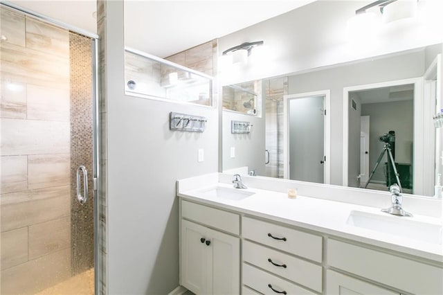 968 E Market St, Warrensburg, MO 64903 - full bathroom featuring a shower stall and double vanity