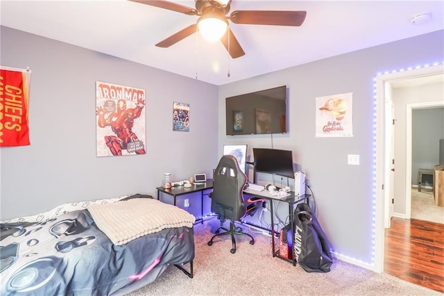 968 E Market St, Warrensburg, MO 64903 - bedroom featuring carpet floors, a ceiling fan, and an office area