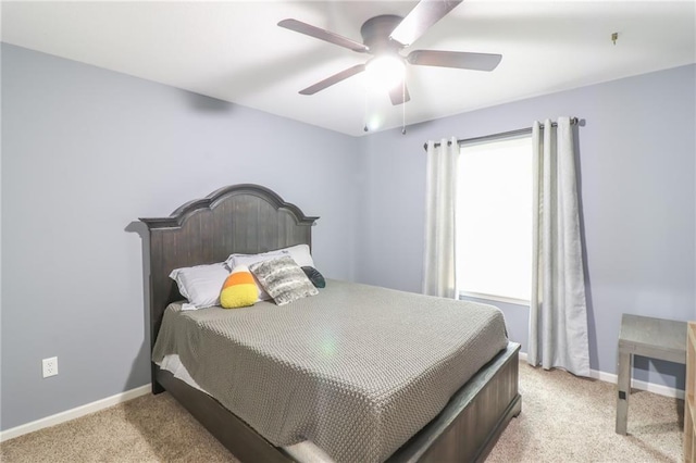 968 E Market St, Warrensburg, MO 64903 - bedroom with light colored carpet and ceiling fan