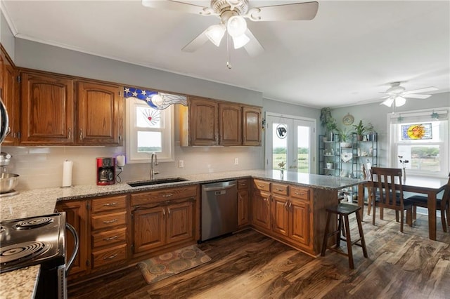 24245 K 68 Hwy, Paola, KS 66071 - kitchen with dishwasher, a ceiling fan, electric range, brown cabinetry, and ornamental molding