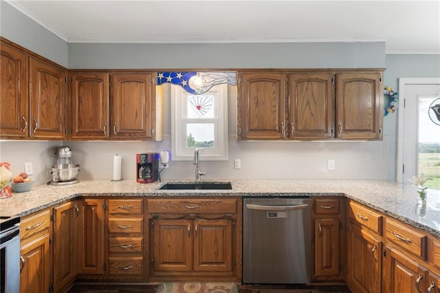 24245 K 68 Hwy, Paola, KS 66071 - kitchen featuring dishwasher, decorative backsplash, light stone countertops, brown cabinets, and crown molding
