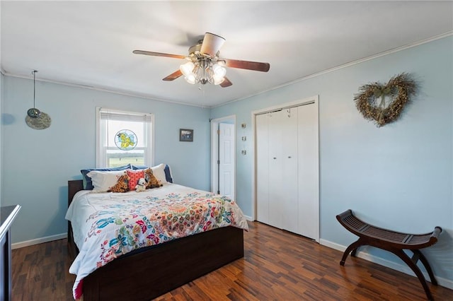 24245 K 68 Hwy, Paola, KS 66071 - bedroom with dark wood-style flooring, a closet, crown molding, and a ceiling fan