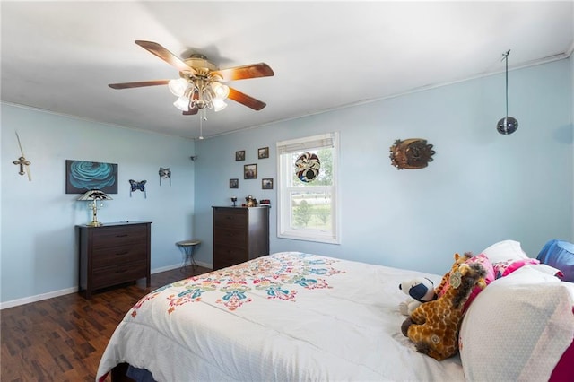 24245 K 68 Hwy, Paola, KS 66071 - bedroom featuring wood finished floors, a ceiling fan, and ornamental molding