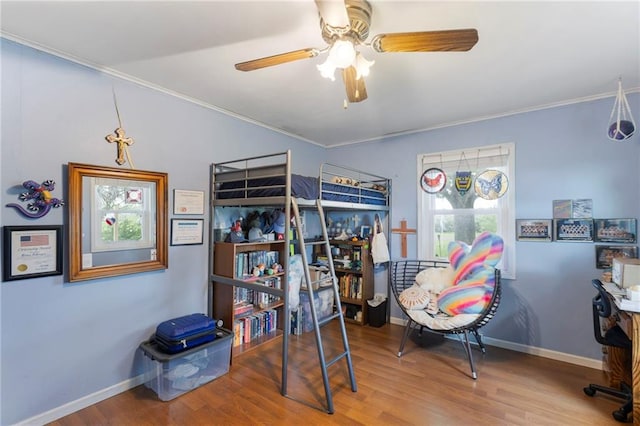 24245 K 68 Hwy, Paola, KS 66071 - bedroom featuring ornamental molding, wood finished floors, and ceiling fan