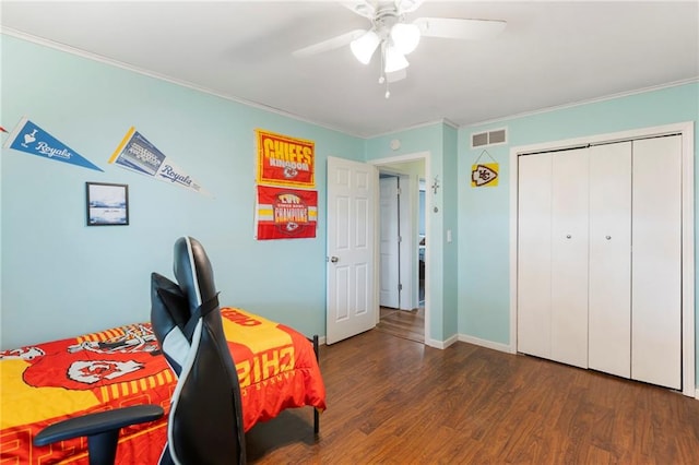 24245 K 68 Hwy, Paola, KS 66071 - bedroom featuring crown molding, wood finished floors, ceiling fan, a desk, and a closet