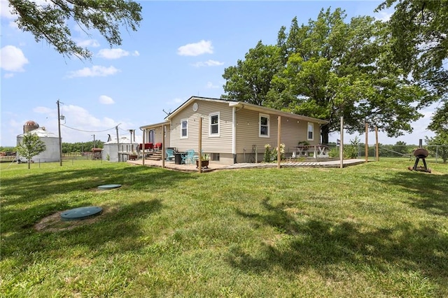 24245 K 68 Hwy, Paola, KS 66071 - back of house featuring a patio