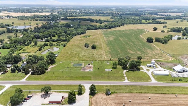 24245 K 68 Hwy, Paola, KS 66071 - aerial view of property and surrounding area with rural landscape and a large body of water