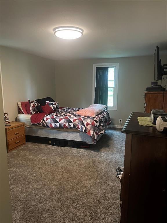 400 N Institute St, Richmond, MO 64085 - view of carpeted bedroom