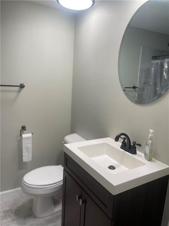 400 N Institute St, Richmond, MO 64085 - bathroom with vanity and toilet