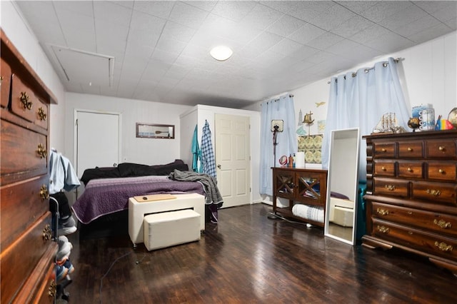 820 S Main St, Lansing, KS 66043 - bedroom with wood finished floors and attic access