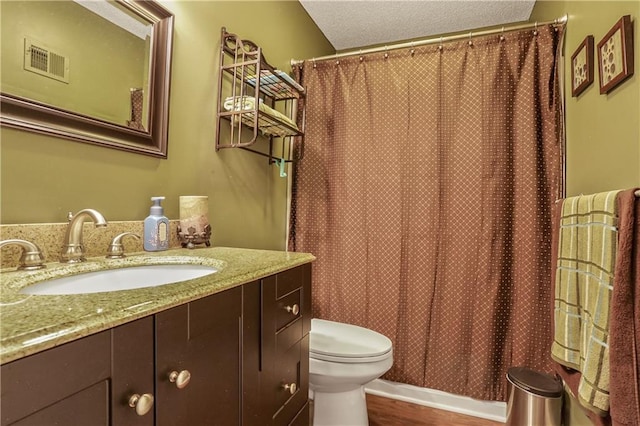 1641 N Hunter Dr, Olathe, KS 66061 - full bathroom featuring vanity, wood finished floors, and curtained shower