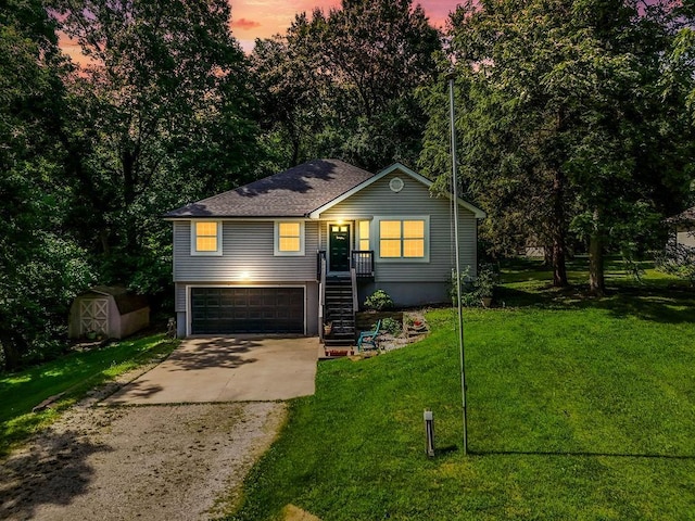 118 SE 215th Rd, Warrensburg, MO 64093 - single story home with driveway, a storage shed, a garage, a yard, and roof with shingles