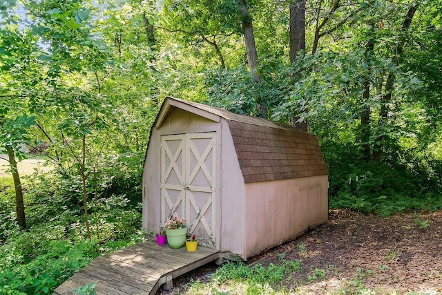 118 SE 215th Rd, Warrensburg, MO 64093 - view of shed with a forest view