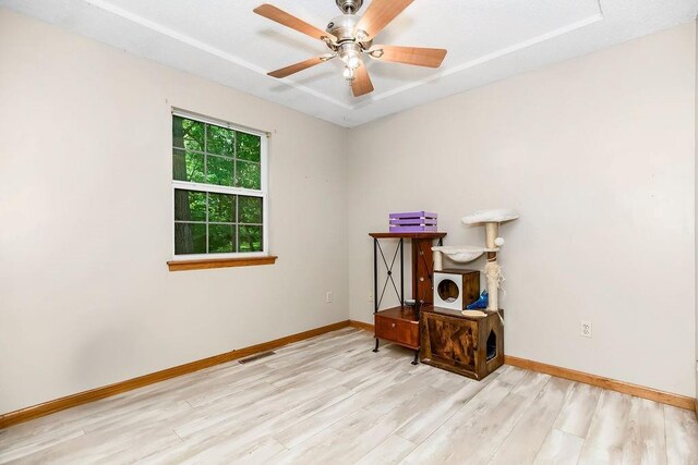 118 SE 215th Rd, Warrensburg, MO 64093 - empty room featuring wood finished floors and ceiling fan