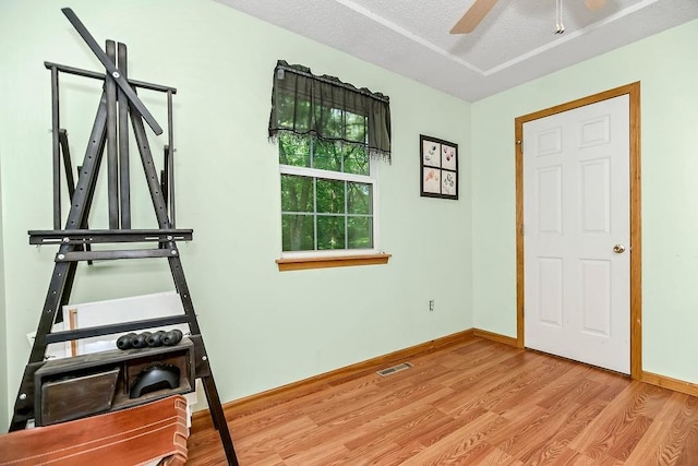 118 SE 215th Rd, Warrensburg, MO 64093 - interior space with wood finished floors and ceiling fan