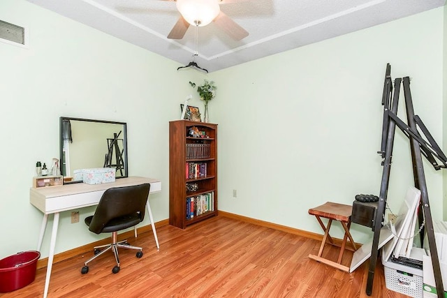 118 SE 215th Rd, Warrensburg, MO 64093 - home office featuring wood finished floors and a ceiling fan