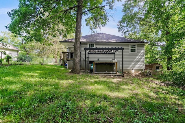 118 SE 215th Rd, Warrensburg, MO 64093 - rear view of property featuring a jacuzzi, a pergola, a fenced backyard, a deck, and roof with shingles