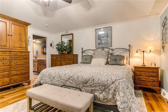 8404 Rosehill Rd, Lenexa, KS 66215 - bedroom with wood finished floors, a ceiling fan, ornamental molding, and ensuite bathroom