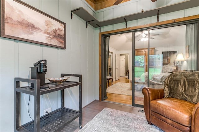 8404 Rosehill Rd, Lenexa, KS 66215 - living area featuring a ceiling fan and wood finished floors