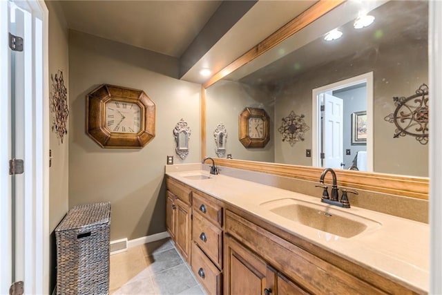 8404 Rosehill Rd, Lenexa, KS 66215 - bathroom featuring double vanity and tile patterned flooring