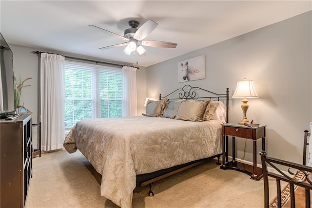 8404 Rosehill Rd, Lenexa, KS 66215 - bedroom with light carpet and ceiling fan