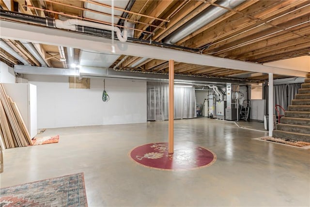 8404 Rosehill Rd, Lenexa, KS 66215 - finished basement with stairs, strapped water heater, and heating unit