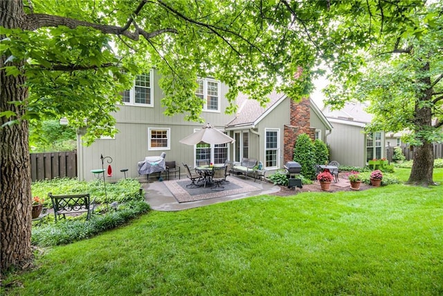 8404 Rosehill Rd, Lenexa, KS 66215 - back of property with a patio