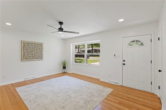 8918 Switzer St, Overland Park, KS 66214 - entryway with ceiling fan, healthy amount of natural light, light wood-style flooring, and recessed lighting
