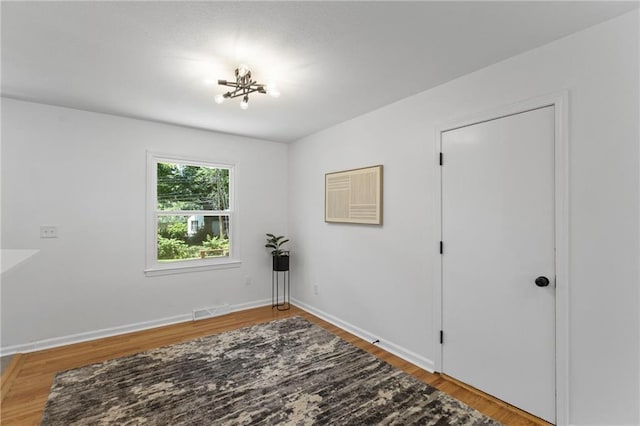 8918 Switzer St, Overland Park, KS 66214 - unfurnished room with light wood finished floors and baseboards