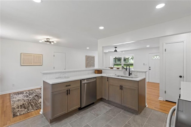 8918 Switzer St, Overland Park, KS 66214 - kitchen featuring stainless steel dishwasher, light countertops, a ceiling fan, stove, and recessed lighting