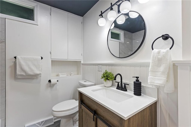 8918 Switzer St, Overland Park, KS 66214 - bathroom featuring vanity and wainscoting