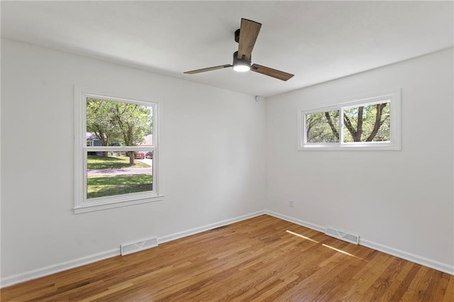 8918 Switzer St, Overland Park, KS 66214 - spare room featuring light wood-type flooring and ceiling fan