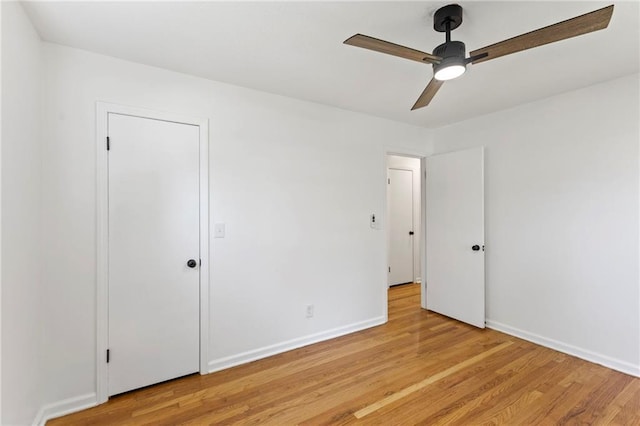 8918 Switzer St, Overland Park, KS 66214 - unfurnished bedroom with light wood-type flooring and ceiling fan