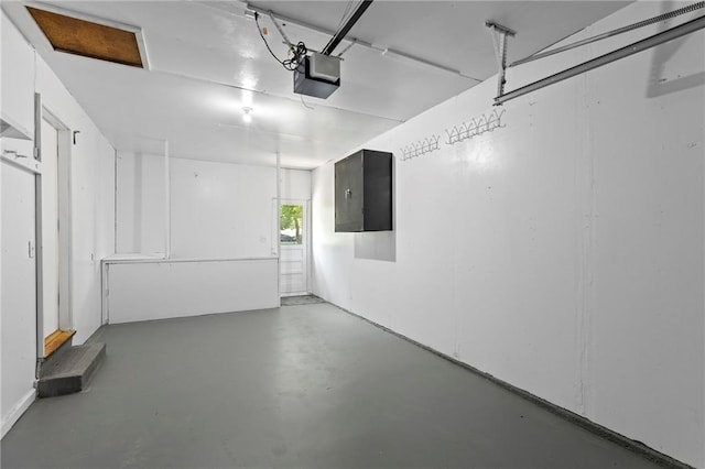 8918 Switzer St, Overland Park, KS 66214 - garage featuring a garage door opener