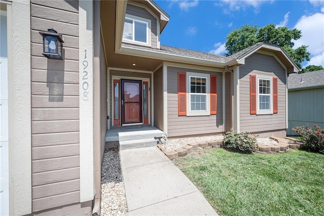 19208 E Lynchburg Pl, Independence, MO 64058 - property entrance with a lawn