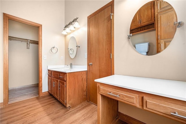 19208 E Lynchburg Pl, Independence, MO 64058 - full bathroom with wood finished floors and vanity