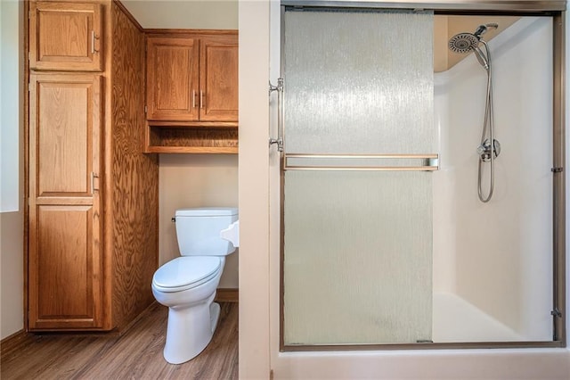 19208 E Lynchburg Pl, Independence, MO 64058 - bathroom featuring a shower stall and wood finished floors